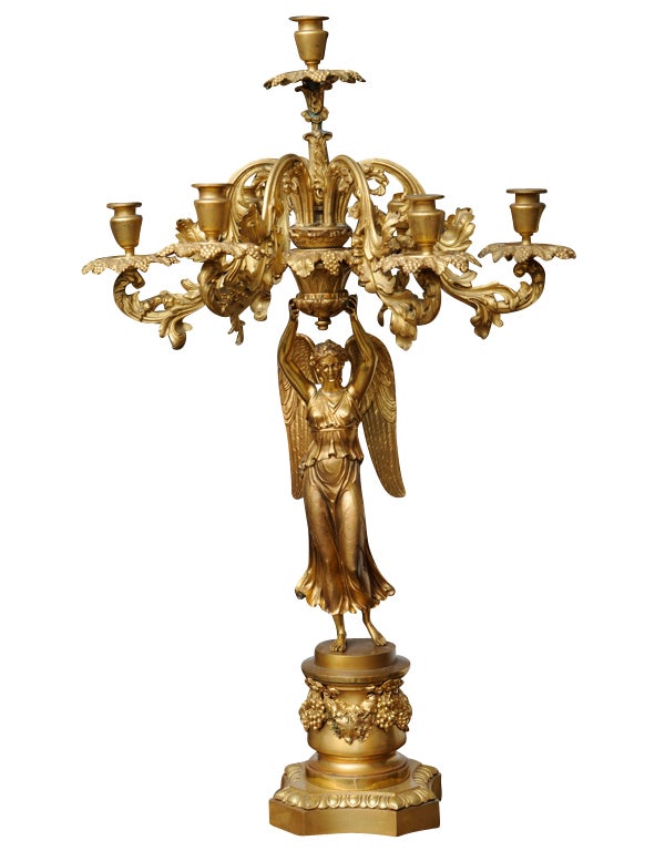 Candelabrum in the form of a winged female upholding torch with six radiating and one central candlebranch, Original Restored Condition

Originally $ 11,200.00

PLEASE CHECK OUT OUR WEB SITE FOR ADDITIONAL SPECIALS