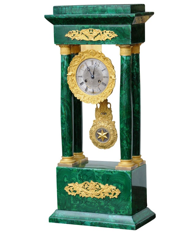 French Empire Columned Malachite Mantel Clock, with Ormolu, Working Order, Original Restored Condition

Originally $ 13,200.00

PLEASE CHECK OUT OUR WEB SITE FOR ADDITIONAL SPECIALS

Malachite is a copper carbonate mineral, with the formula
