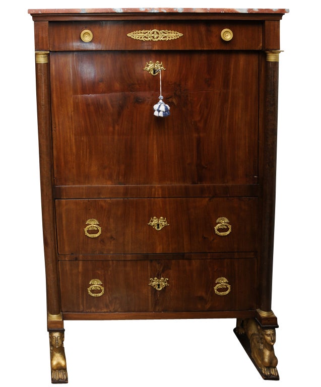 Empire Ormolu Mounted Mahogany Secretaire having a marble top over a single frieze drawer, with a fall front enclosure concealing a fitted interior over two long drawers, flanked by columns, Original Restored Condition

Originally $