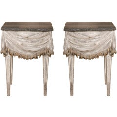 A pair of 19th century French Neoclassical grey painted carved wooden sidetables