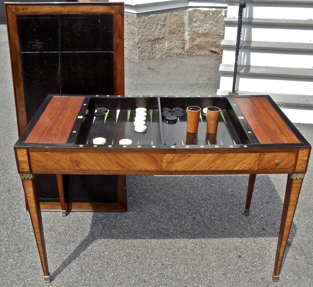 Period Louis XVI Satinwood Tric Trac or Backgammon Table.  Horn and Ivory board.  Has its original baise covered top.  Original Ivory playing pieces