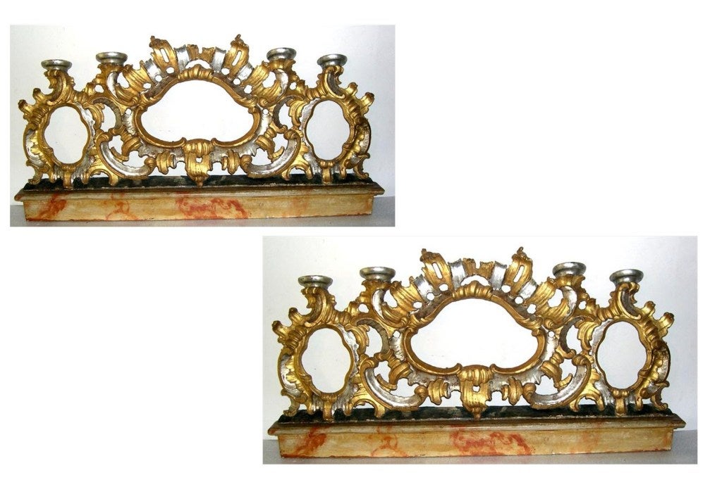 Two Italian Baroque Altar Candelabra , original condition, gold and silver leaf, marbelised base, one of them with original handwritten text in latin, dated 1760.