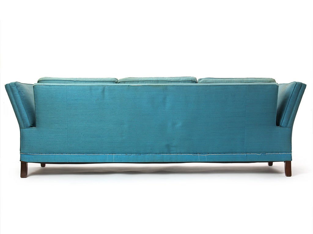 Upholstery vintage open arm sofa