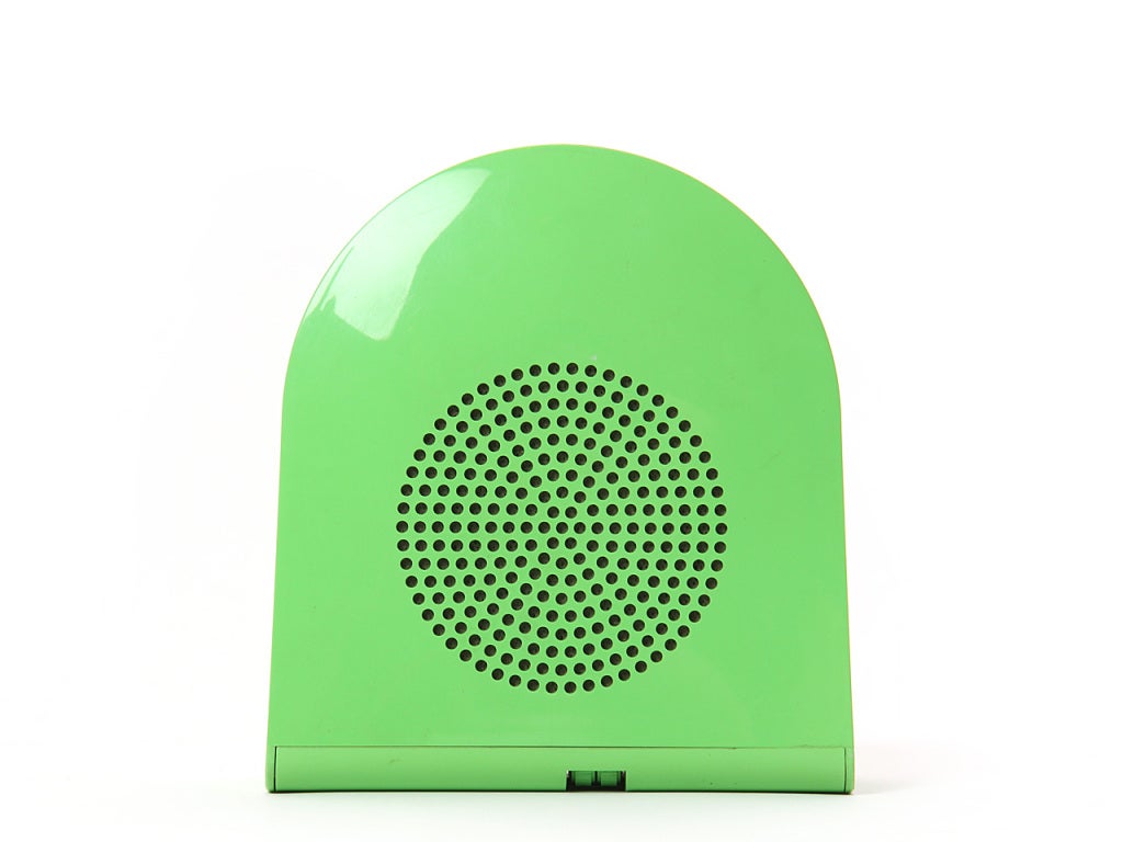 A green portable 45 record player with built in retractable handle. 