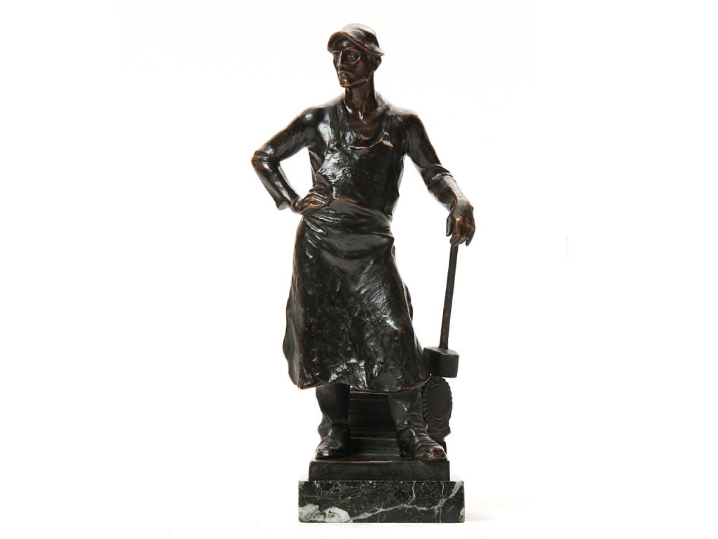 A bronze statue of a blacksmith on a marble base by Adolph Joseph Pohl. Made in Austria, circa 1920s.
