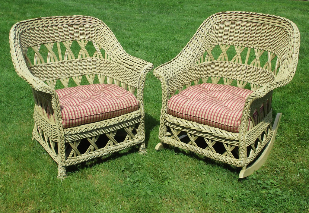 Bar Harbor wicker armchair & rocking chair in bone colored painted finish. Series of woven three-strand XXX's referred to as Cape May design. Classic rounded form with wide flared arms & deep seats. Woven seat platforms.  Measurements as follows -