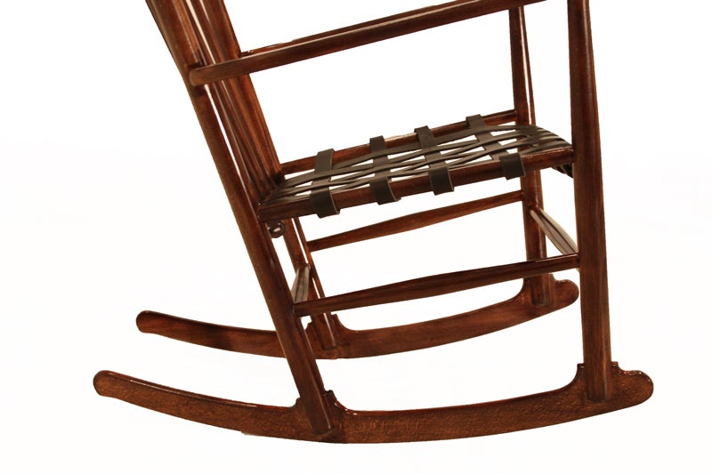 Mid-20th Century Hans Wegner rocking chair with black leather strap seat