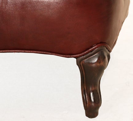 Obtuse oxblood leather and Walnut wing back chair In Good Condition For Sale In Hollywood, CA