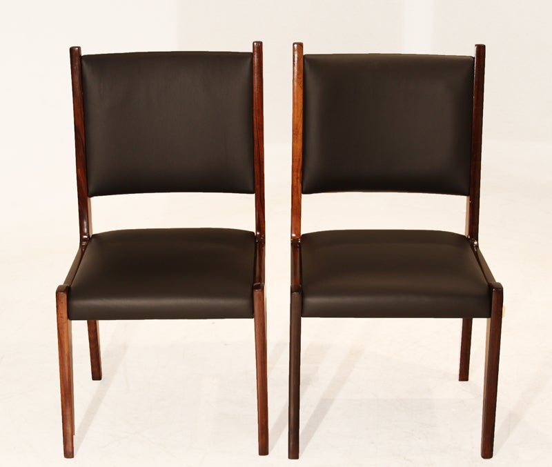 Pair of Sergio Rodrigues Rosewood and Black Leather Side Chairs