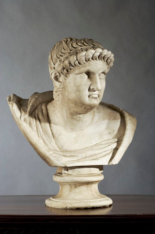 Plaster bust of Roman figure.