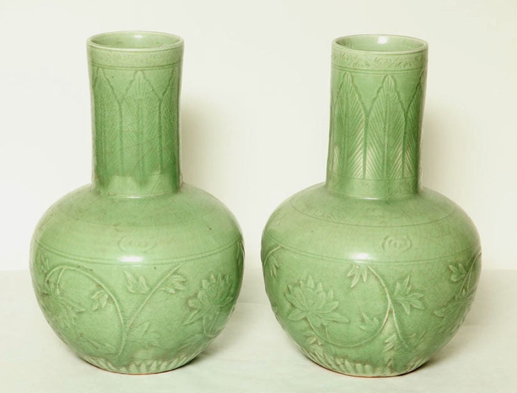 A PAIR OF CELADON GLAZED VASES. CHINESE, 19th CENTURY