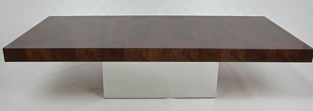 Large rectangular Patchwork Burl Coffee Table on a Mirror polished Stainless Steel clad base by Milo Baughman.  The top has been refinished in hand rubbed lacquer and the base has been restored with new #8 Stainless Steel veneer.  Evocative of Paul