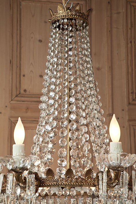 Perfect for displaying a spectrum of illumination all around your favorite room, this exquisite chandelier boasts external and internal lighting to take the most advantage of the prism effect of the multitude of crystal shapes. As is the case with
