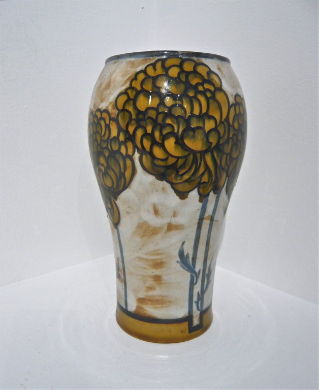 A wonderful, hand-painted and highly collectable English art pottery vase by Royal Doulton, circa 1920, from the Harriman Judd Collection.  Whether used today as a decorative accessory or as an actual vase, this is a very special piece as attested