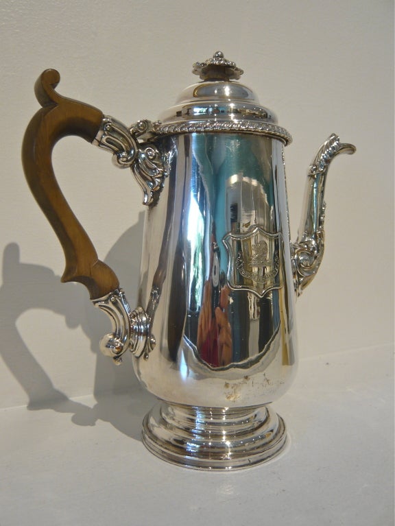A lovely 19th century Sheffield silverplate Georgian-style English Victorian coffee pot with armorial cartouche featuring the English lion and motto 