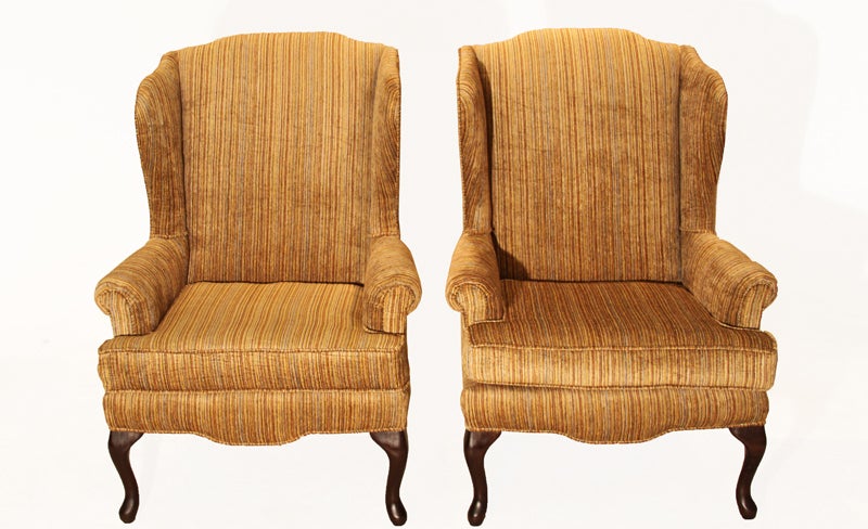 Pair of beautiful striped silk velvet wingback chairs with cabriole legs in front and curved back legs. The fabric is a dense soft silk velvet.
Measures: Seat depth measures 22".

