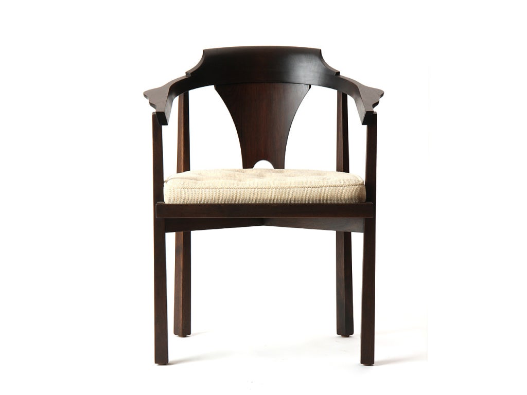 An ebonized mahogany horseshoe-back dining chair, with a flared rosewood backsplat and a loose button-tufted cushion by Dunbar. Pair available. 

Lighter version available in listing ID: U1101038903412