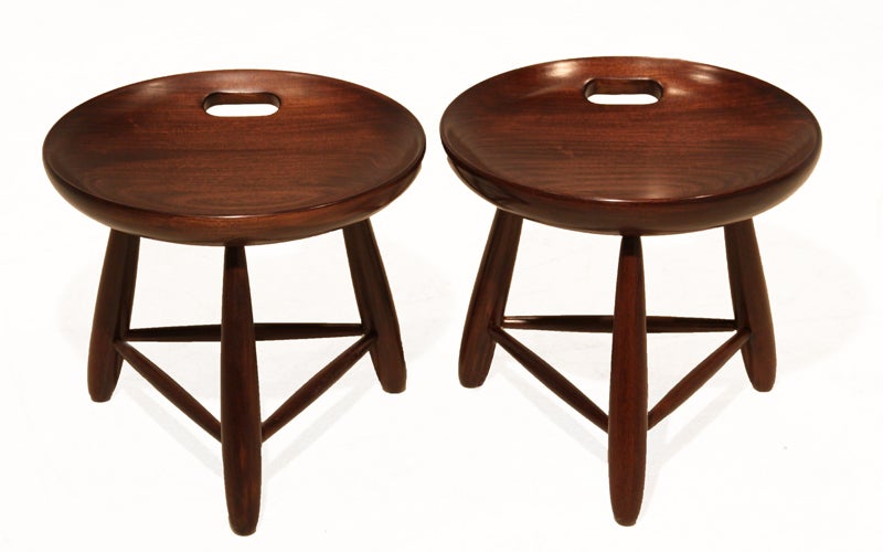 A pair of limited edition milk stools made from thick Brazilian Peroba wood by Sergio Rodrigues at his Botafogo workshop in Rio de Janeiro. We had purchased only a few of these stools from an earlier production, as they are quite rare and hard to