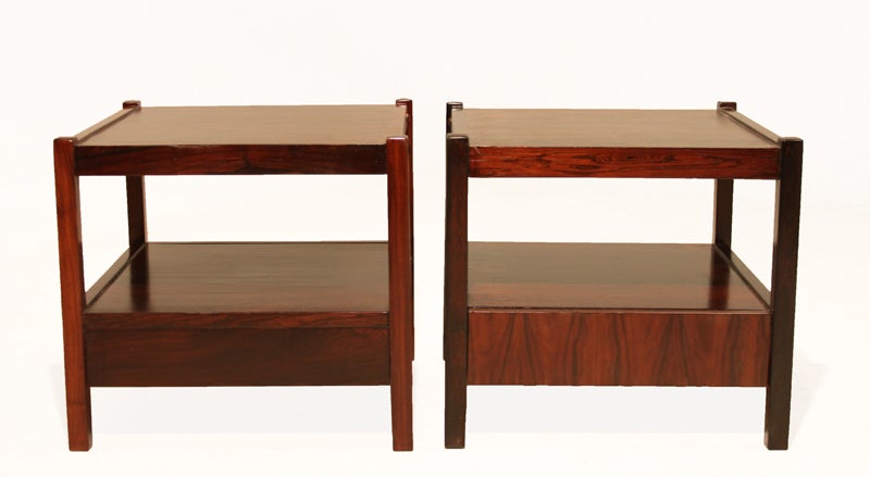 Pair of brazilian hardwood side tables each with a single drawer. The side tables feature dramatic grain throughout.

Many pieces are stored in our warehouse, so please click on 