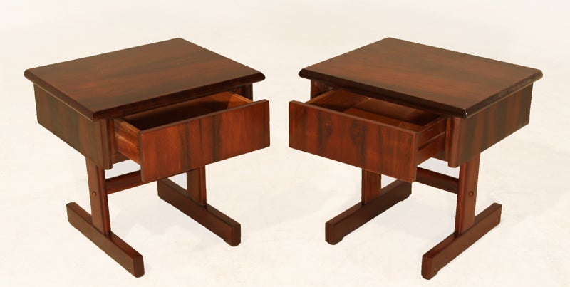 Pair of petite Brazilian Rosewood night stands or side tables with a single drawer each. The tables feature dramatic and beautiful grain details throughout.

Many pieces are stored in our warehouse, so please click on contact dealer under our logo