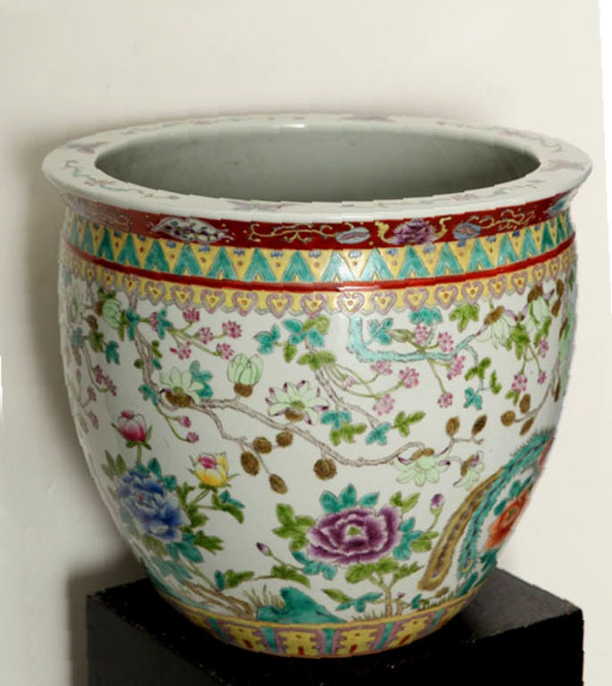 DECORATED WITH PHEASANTS, PEONIES AND LEAFY FLOWERING TREE BRANCHES IN MULTICOLOR ENAMELS, THE INSIDE PAINTED WITH A MARINE SCENE FEATURING SWIMMING FISH.
