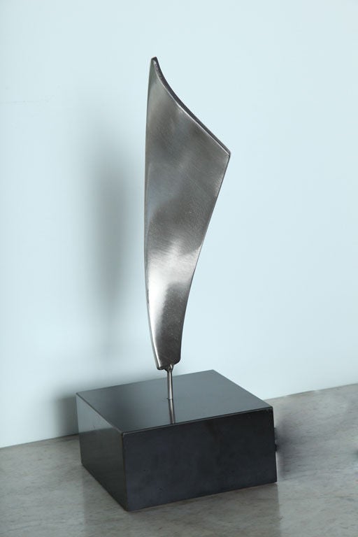 Kafka stainless steel sculpture on base. Signed kafka 1967.