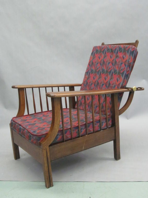 Classic 'William Morris' lounge / club chair / chaise longue  with adjustable back support via a notched wood and solid brass rod adjusting system. This 1950 model is in cherry and has a pull-out leg/foot support to convert into a chaise-longue.