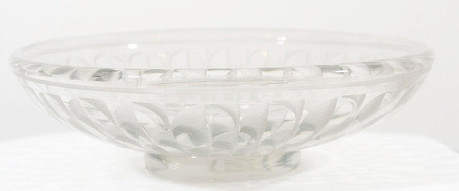 Jean Luce acid etched crystal glass bowl. Signed on the bottom with the etched monogram of the double ‘L’.

Jean Luce (French, 1895-1964) Bio – “Trained as a ceramist and glassmaker at his father’s studio, Jean Luce exhibited his own designs for
