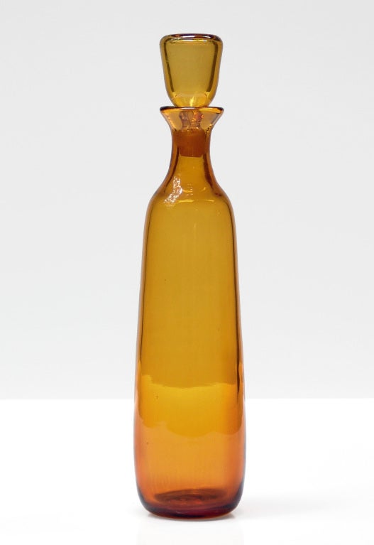 ______

(Items also available individually, please email to inquire.)

LEFT: tall cylindrical decanter with narrow neck and flared opening, designed by John Nickerson in 1974, made for 1 year only. Design #7414 in Wheat, pictured in the 1974