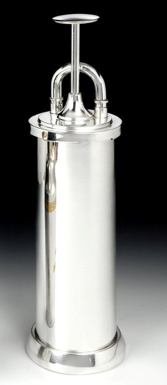 ‘Trombone’ cocktail shaker.

A rare and important, silver-plated cocktail shaker manufactured by Napier, USA to a patented Alfred Dunhill design, circa 1925, in the form of a stylised slide-trombone, the cylindrical body surmounted by a cover with