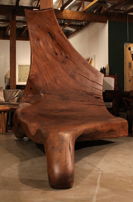 A huge, stunning lounge chair fashioned from a solid Pequi tree root by Zanini de Zanine.  This root came from a farm in Bahia Brazil.

Many pieces are stored in our warehouse, so please click on CONTACT DEALER under our logo below to find out if