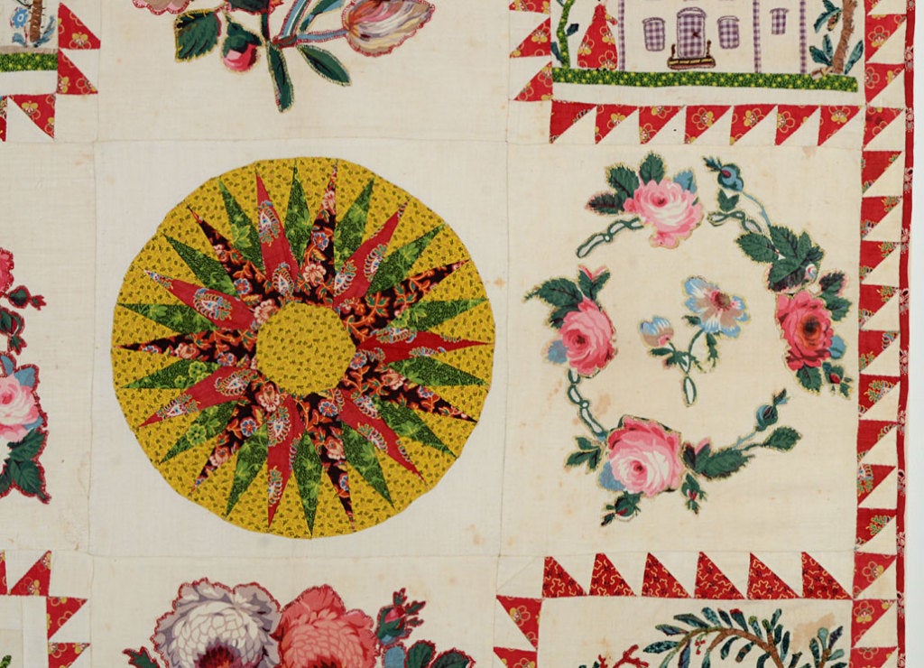 This Figural Album Crib Quilt is unusual in several ways. Very few Album Crib quilts were made. More rare is the depiction of people and buildings. The flora and figures are finely detailed. The composition with chintz wreaths and the Mariner's