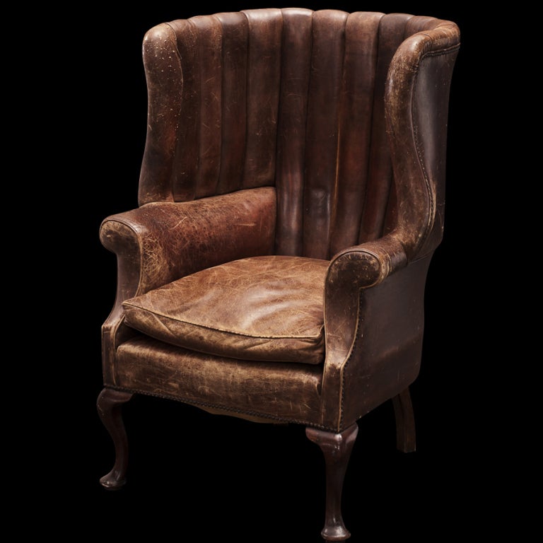 Channel back, roll arm, separate seat cushion, simple legs