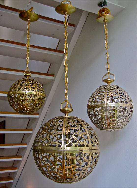 Mid-20th Century Trio of Pierced Brass Asian Ceiling Pendants in Various Sizes
