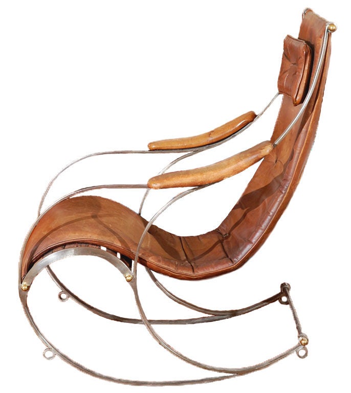 19th Century Rocking Chair by R.W. Winfield
England 1860's.
Robert W. Winfield is largely regarded as a metallic campaign furniture maker.  Winfield, like many of his contemporaries, sought to establish a new design style that could represent the