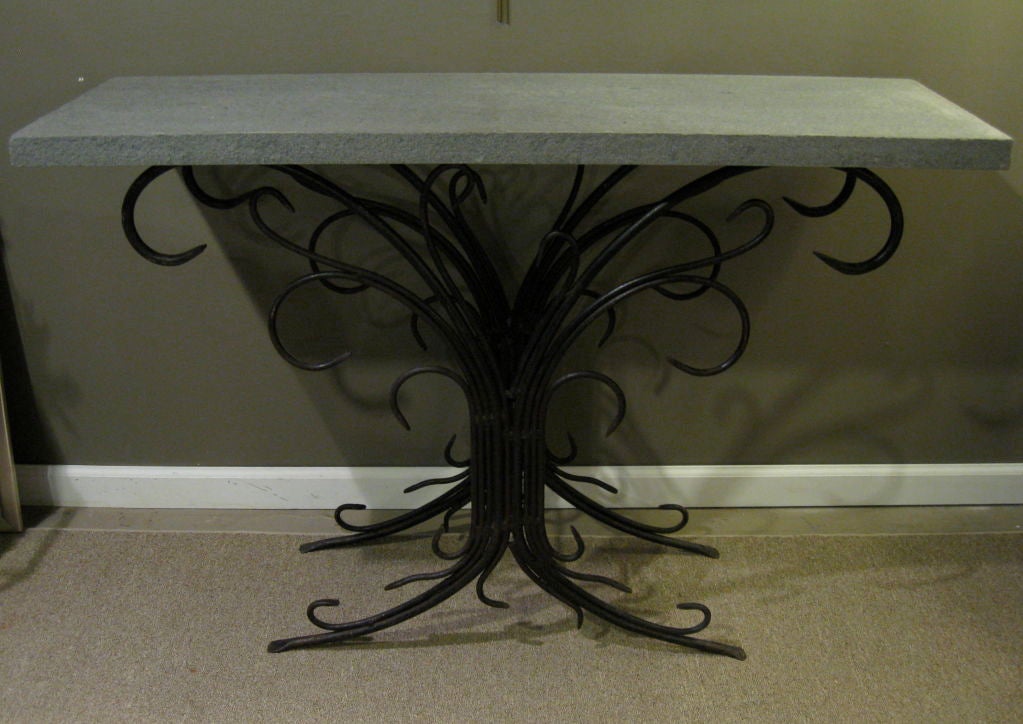 Wrought iron console / sofa table, with bluestone top.  

PLEASE NOTE: A 1 INCH THICK BLUESTONE TOP, WITH SMOOTH EDGES HAS REPLACED THE THINNER TOP SEEN IN IMAGE 1.