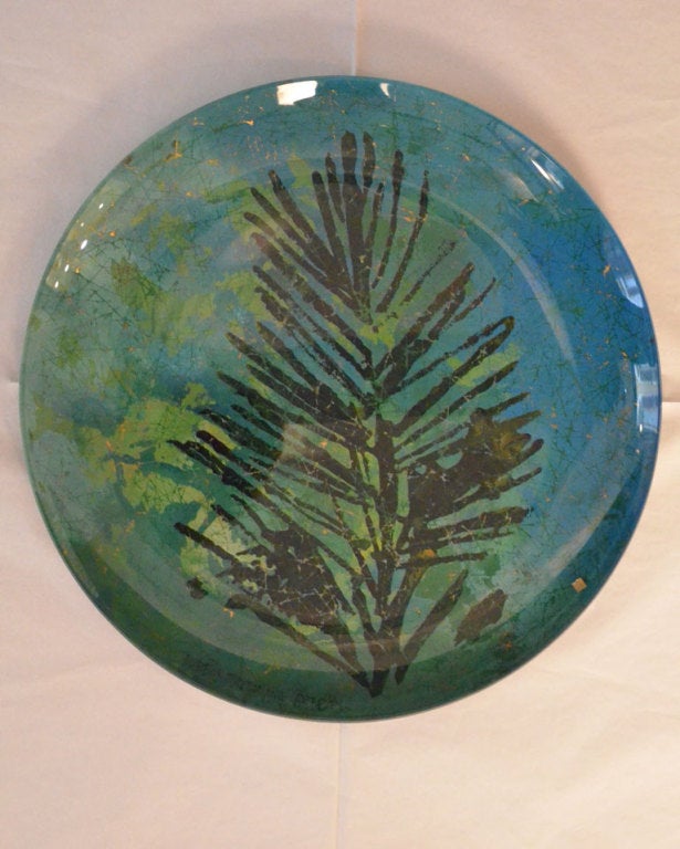 Centrepiece in  reverse-painted glass  with flower decoration.
Designed by Dubè for Fontana Arte. 1950's.
Original paper label.
