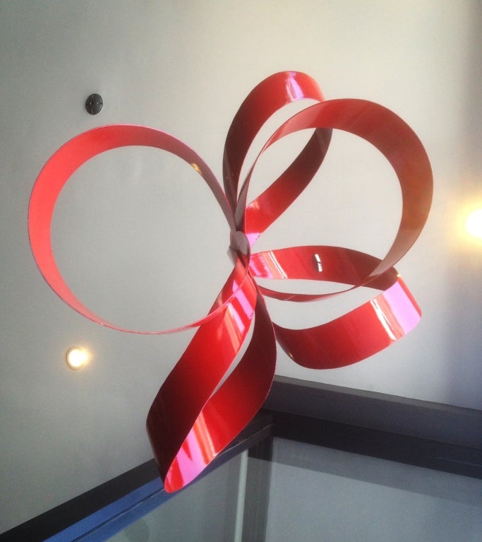 Stunning mid century modern ceiling or wall sculpture by Paul Chilkov.
This sculpture is the only one made, it was done in 1978 and meant to be hung from the ceiling but can also be used as a table or wall sculpture.
Depicting a red ribbon