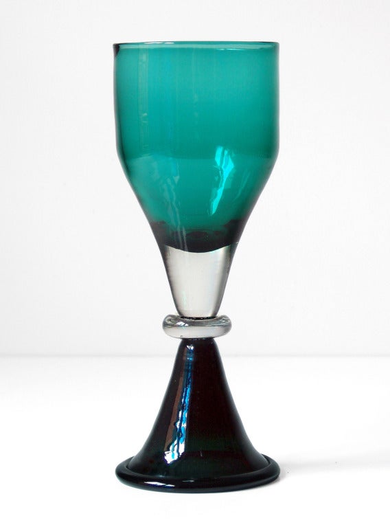 Goblet form vase with rolled rim foot and central lozenge. Upper body is encased in Crystal with sommerso technique. Designed by Wayne Husted for the Blenko Glass Company in 1959, made for 1 year only. Design #5923 in Nile green, pictured in the
