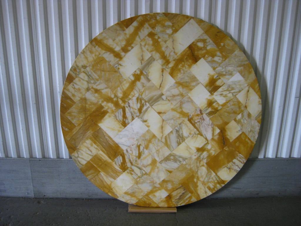 Please see thumbnail for gold fluted base, Mid-Century Modern round dining or entry table with patchwork marble, after Paul Evans and similar to Saarinen table for Knoll, this item is now on sale for a clearance price.