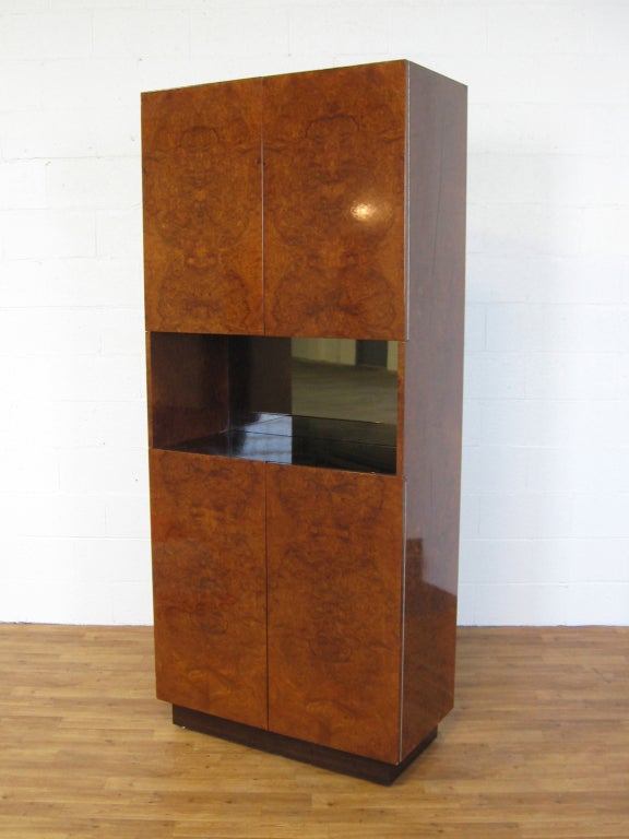 Pace Collection furniture produced in the 1970s is of exceptionally high quality and is known for their use of luxurious materials and finishes. This highly functional piece was designed as a dry bar, but serves equally well as a cabinet or storage