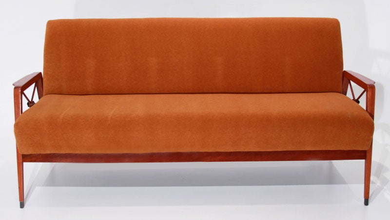 Tangerine mohair and exotic wood frame sofa with bronze-tipped feet and bronze medallions designed for Cavallaro, Brazil. Seat depth 19.25