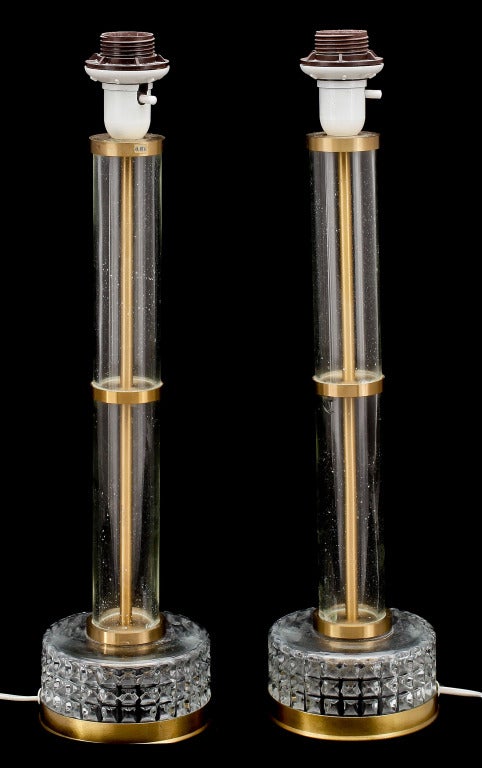 A Pair of table lamps by Orrefors
Some small chips on glass.
Measures: The lamp base is 17.25