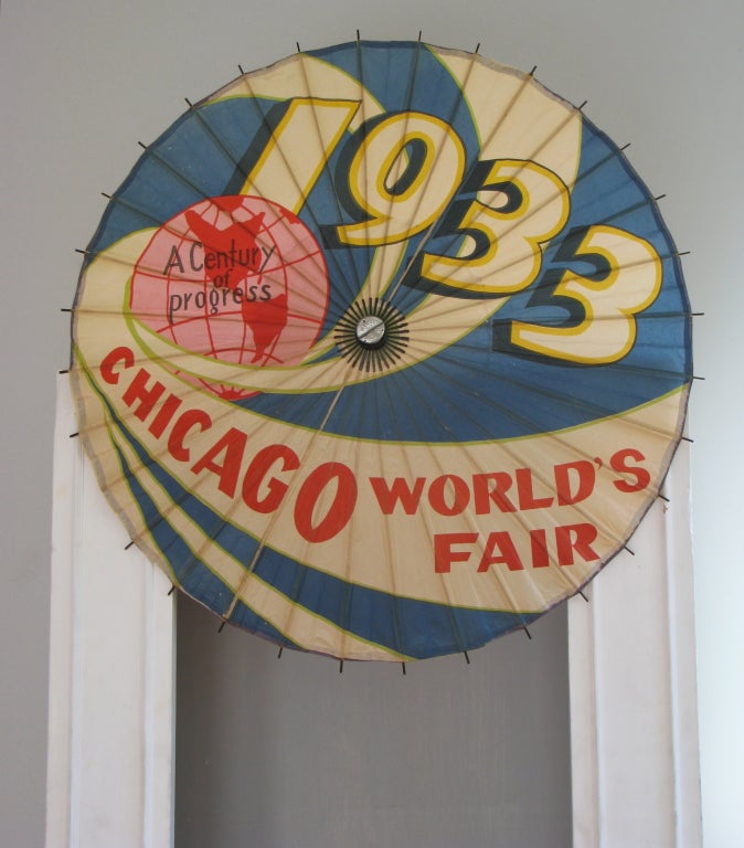 Wonderfully Graphic Chicago World's Fair Paper Umbrella circa 1933. Image #9 shows the piece lit from behind, a striking graphic statement. 


A Century of Progress. One of the highlights of the 1933 World's Fair was the arrival of the airship
