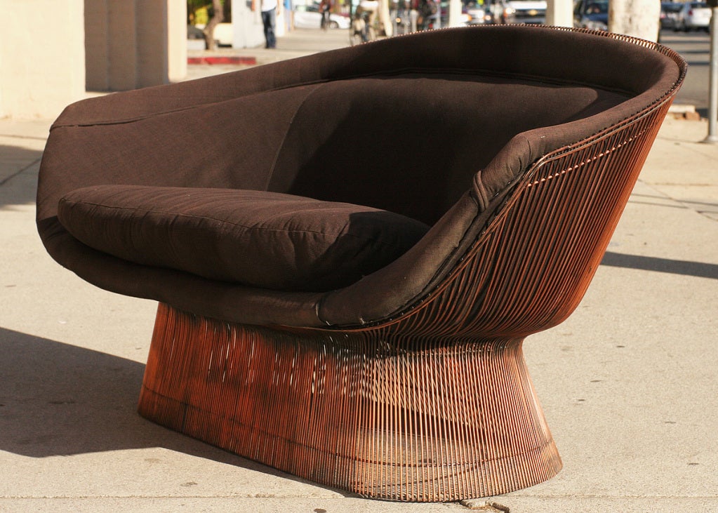This extremely rare sofa by Warren Platner (1919-2006) is one of the few produced by Knoll between 1969-1970 in solid copper, unlike the rest which have either a nickel or painted metallic bronze finish.  Likely a commissioned production, our set