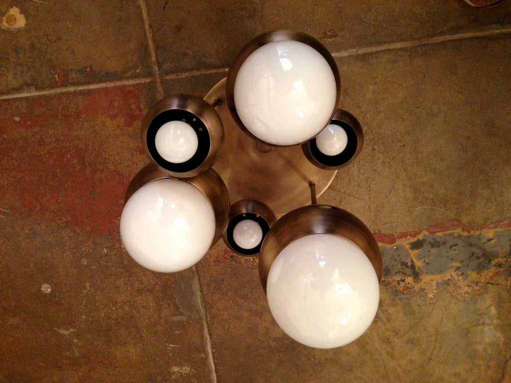 A pair of six light Italian flush ceiling light in an antique brass finish. Two/Pair available.
