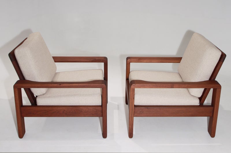 Solid teak Danish wood and coarse linen armchairs attributed to HW Klein. The wood is smooth and newly oiled and altogether, the chairs are very comfortable and attractive. Seat depth 22