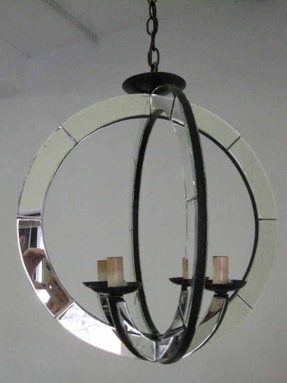 2 French Mid-Century Modern style Mirrored Pendants / Chandeliers in the style of the French legendary 1930's designer, Serge Roche. The pieces are light and ephemeral with their open, transparent, modern aesthetic. Each pendant consists of 2