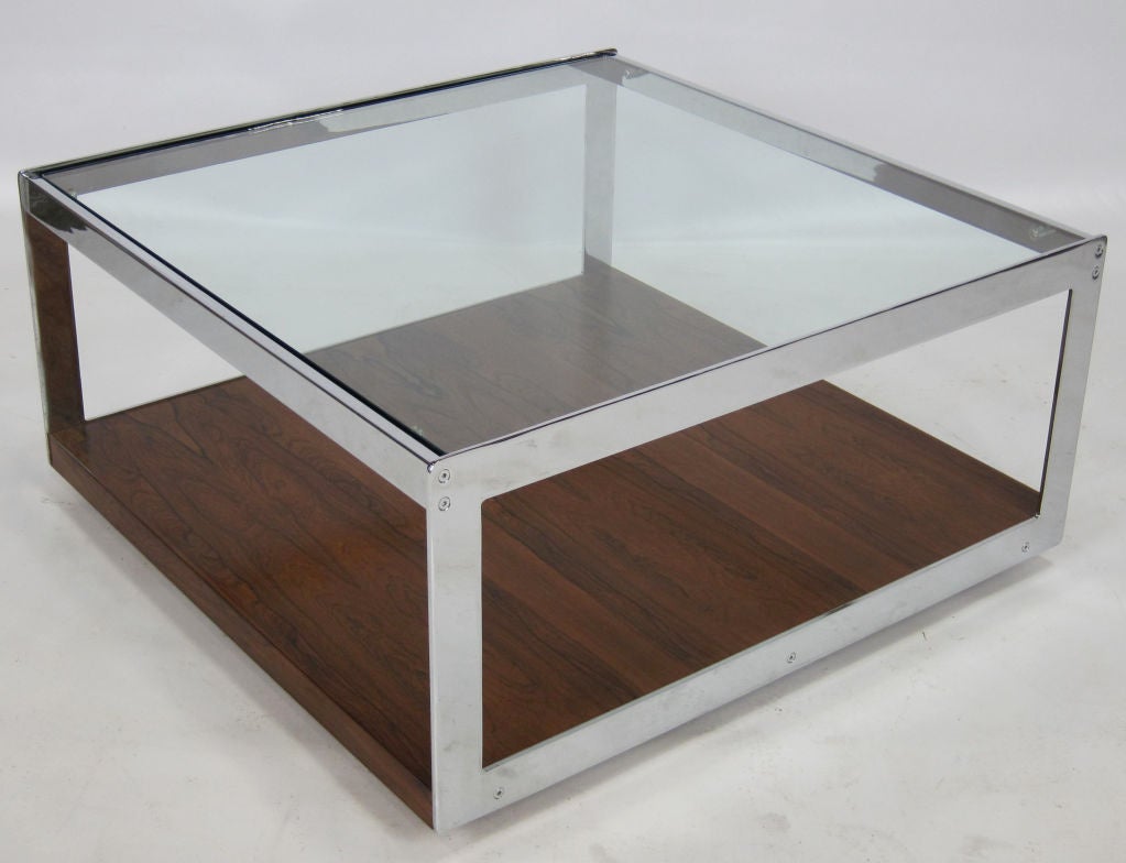 Rare Brazilian rosewood and chrome coffee table with inset glass top by Richard Young for Merrow Associates sold through Harrod's-London. Concealed casters. This design is very similar in feel and construction to the Knoll collection by Joseph