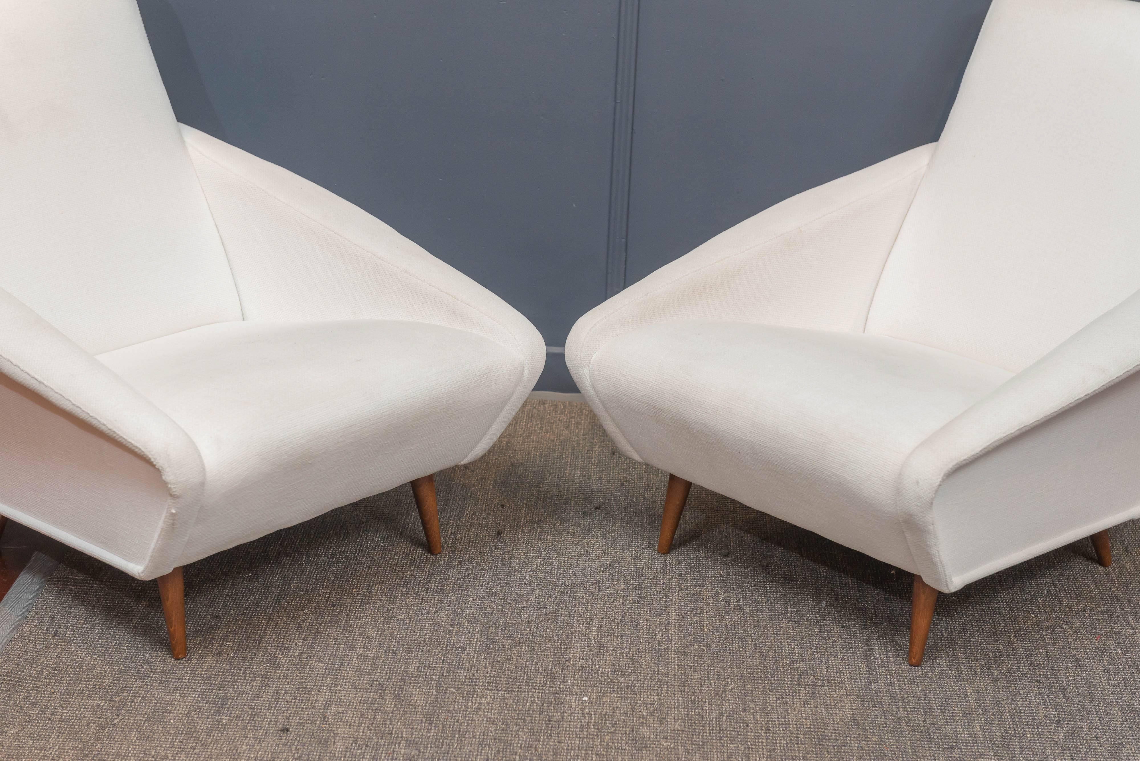 Rare original pair of Gio Ponti style lounge chairs.
Upholstered in a woven cotton five years ago that is usable as-is or could be re-done to your specifications.
Structurally sound and super comfy.